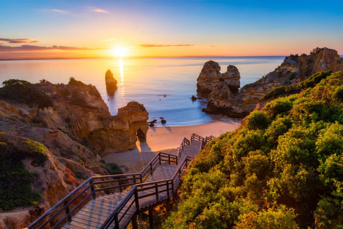 Praia do Camilo beach with famous wooden staircase in Lagos, Portugal