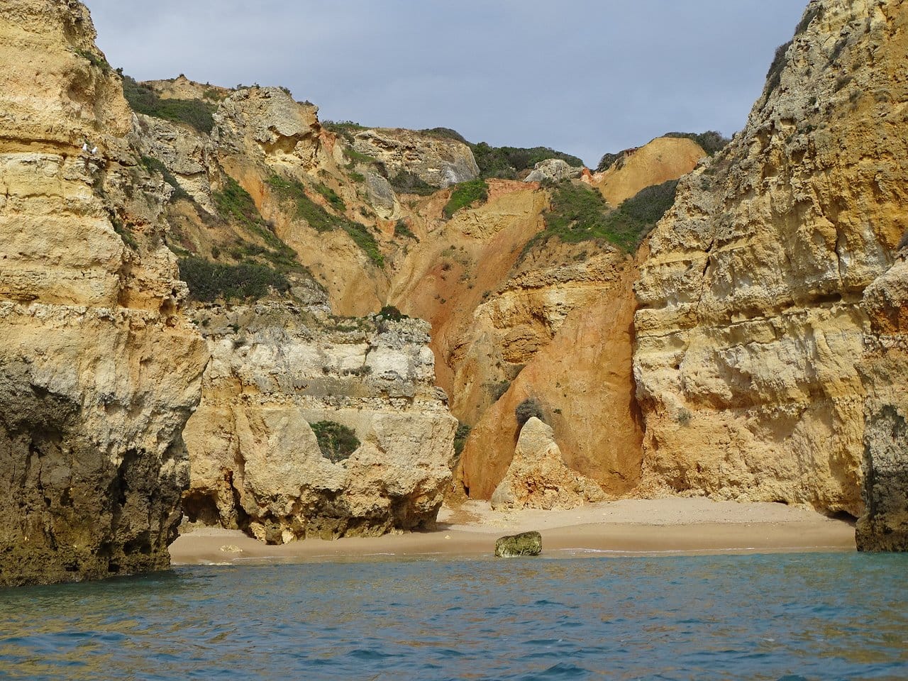 Praia da Boneca tiny beach near Ponta da Piedade, Lagos